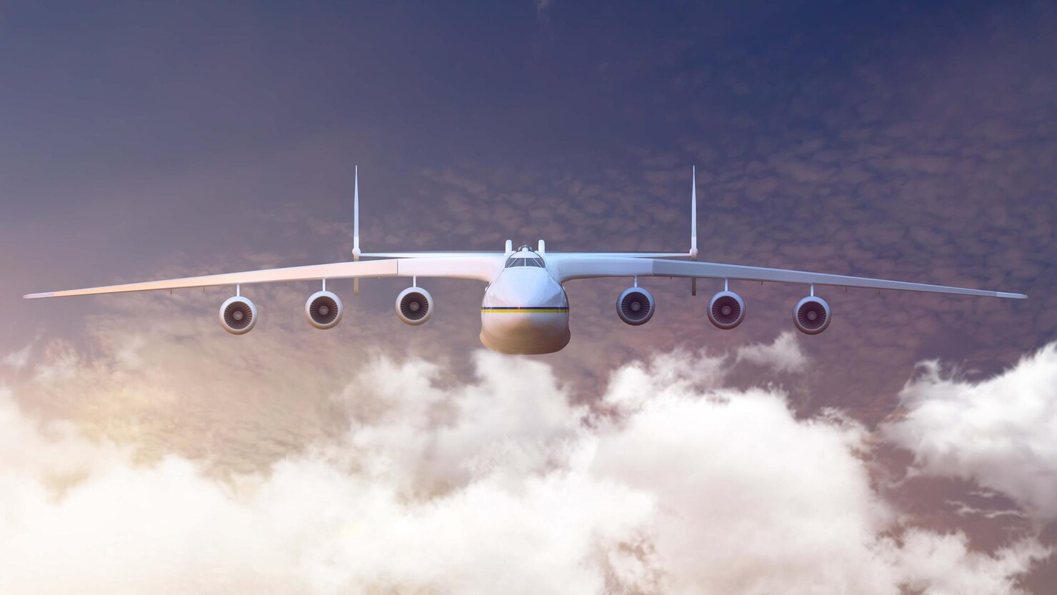 Private aircraft on runway with city skyline